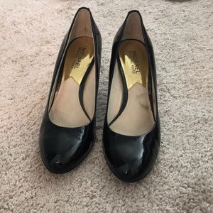 Michael Kors black patent pumps